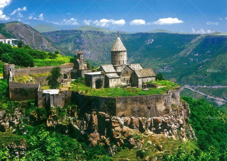 The Tatev Monastery (Armenian: Տաթևի վանք Tat'evi vank' ) is a 9th-century Armenian Apostolic monastery located on a large basalt plateau near the Tatev village in Syunik Province in southeastern Armenia.