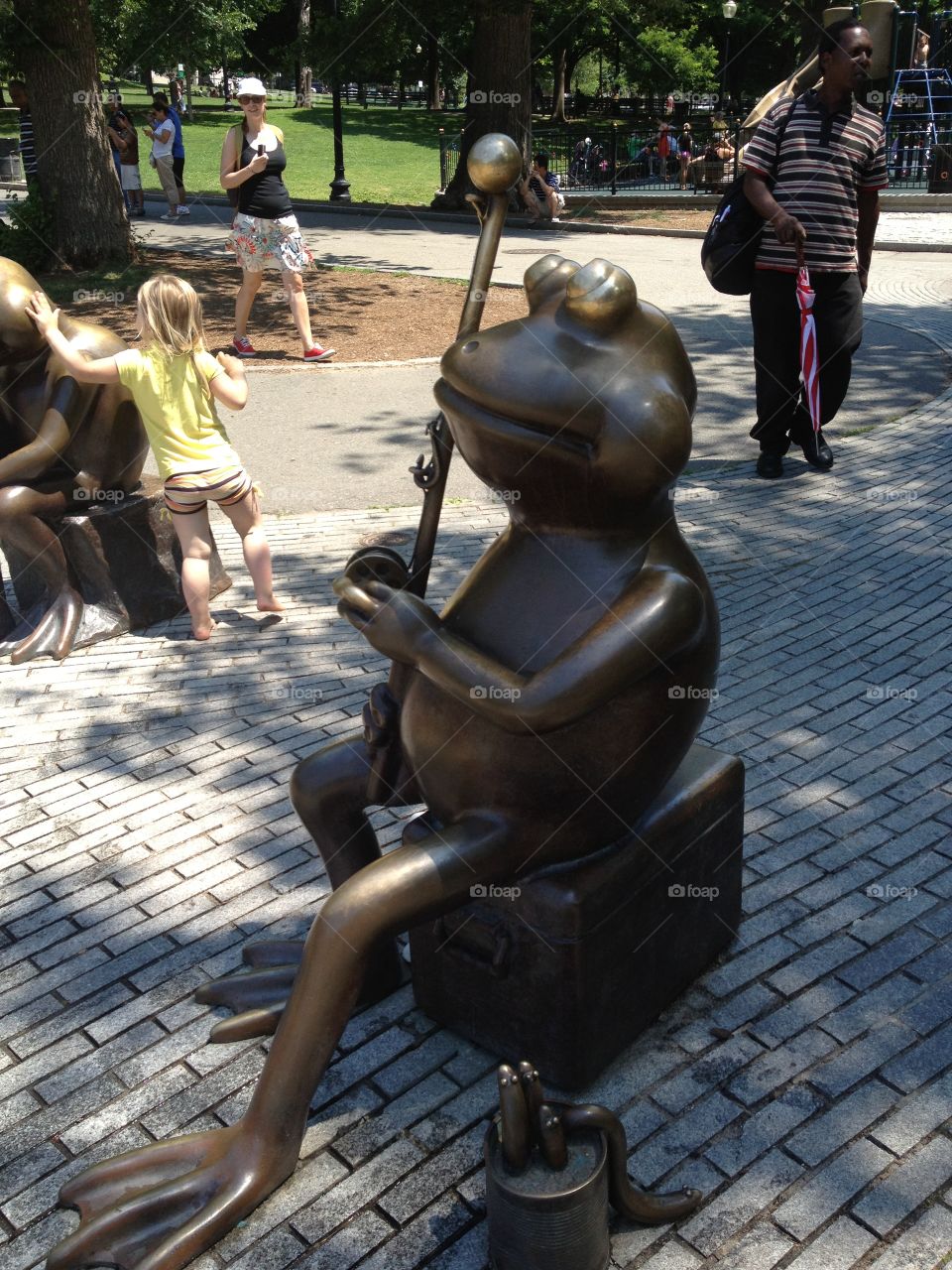 Susan Archer. Frog musician at Frog Pond in Boston, MA