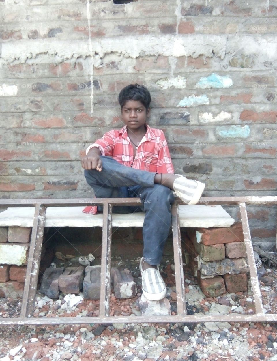 Hindustani boy / lonely boy / little child sitting / child sitting style / indian child with style /