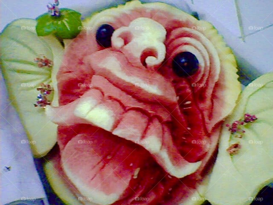 Water melon carving devils on stock photo