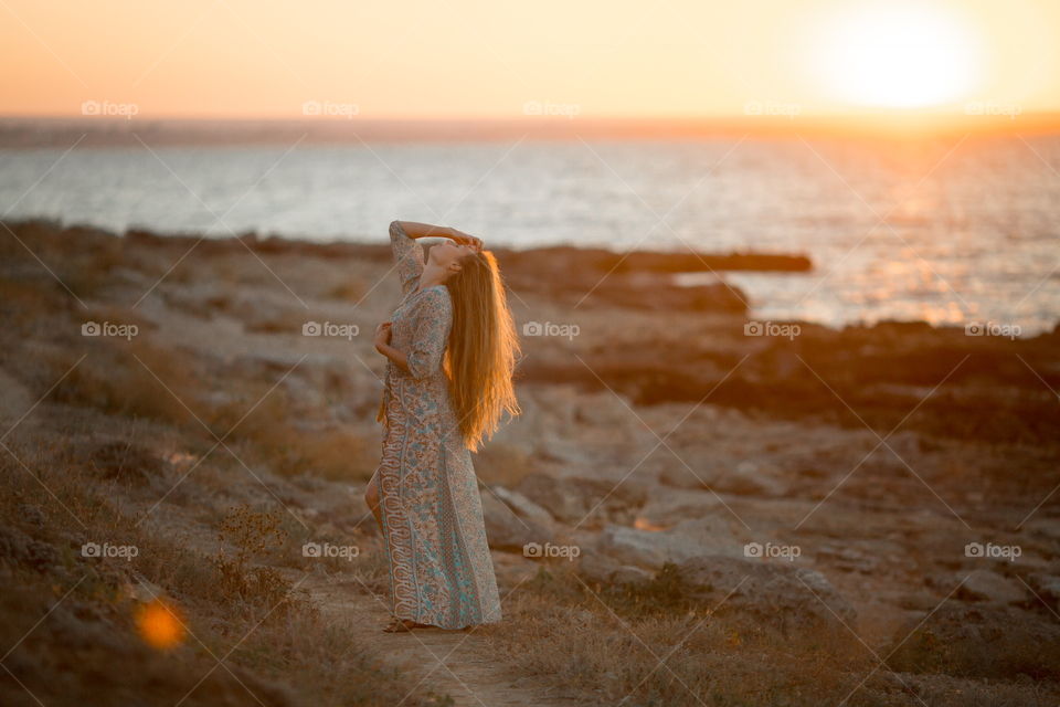 Portrait of beautiful young woman at outdoor