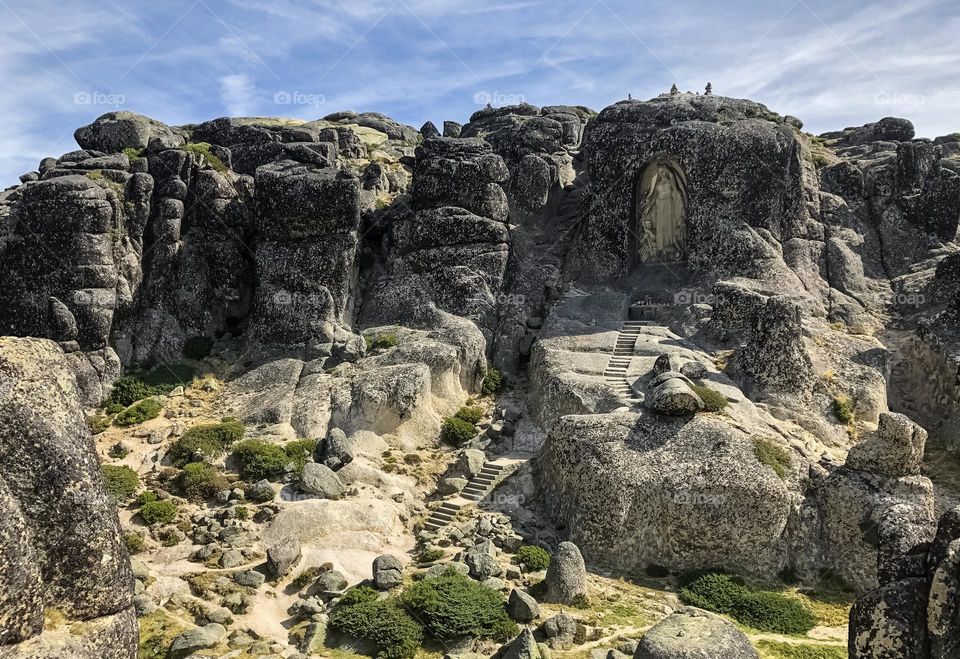 Nossa Senhora da Boa Estrela carved out of the granite rock face at Serra Da Estrela National Park, Portugal 