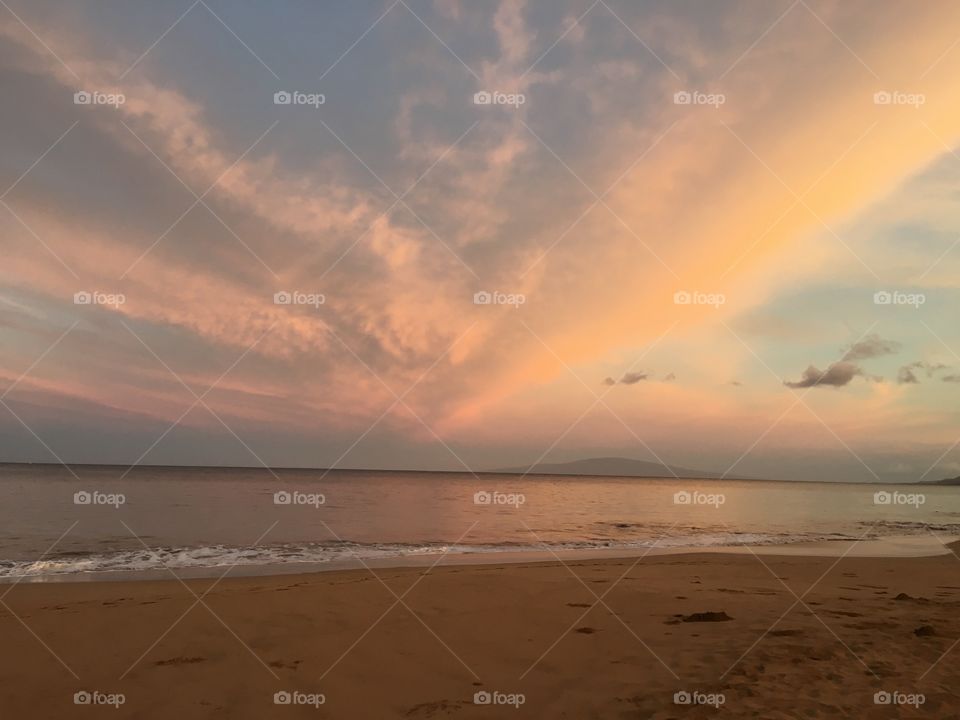 Empty beach at sunrise.