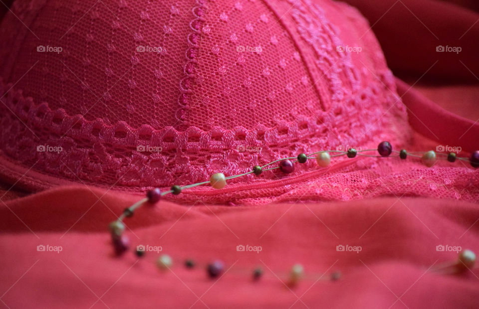 Pink bra, necklace and shawl