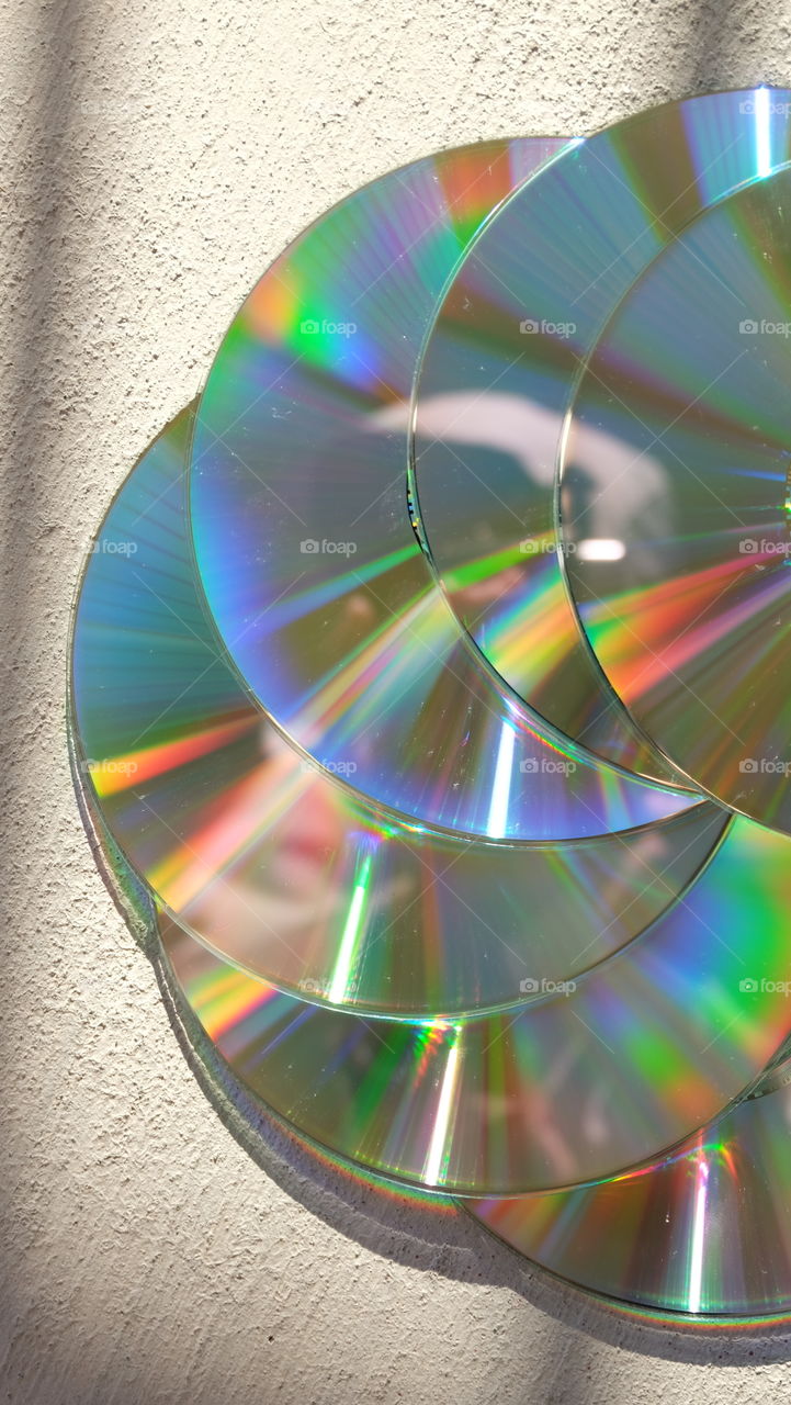Colorful lights reflecting from compact disks