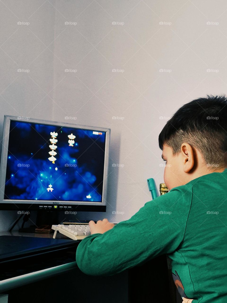 child playing on the computer