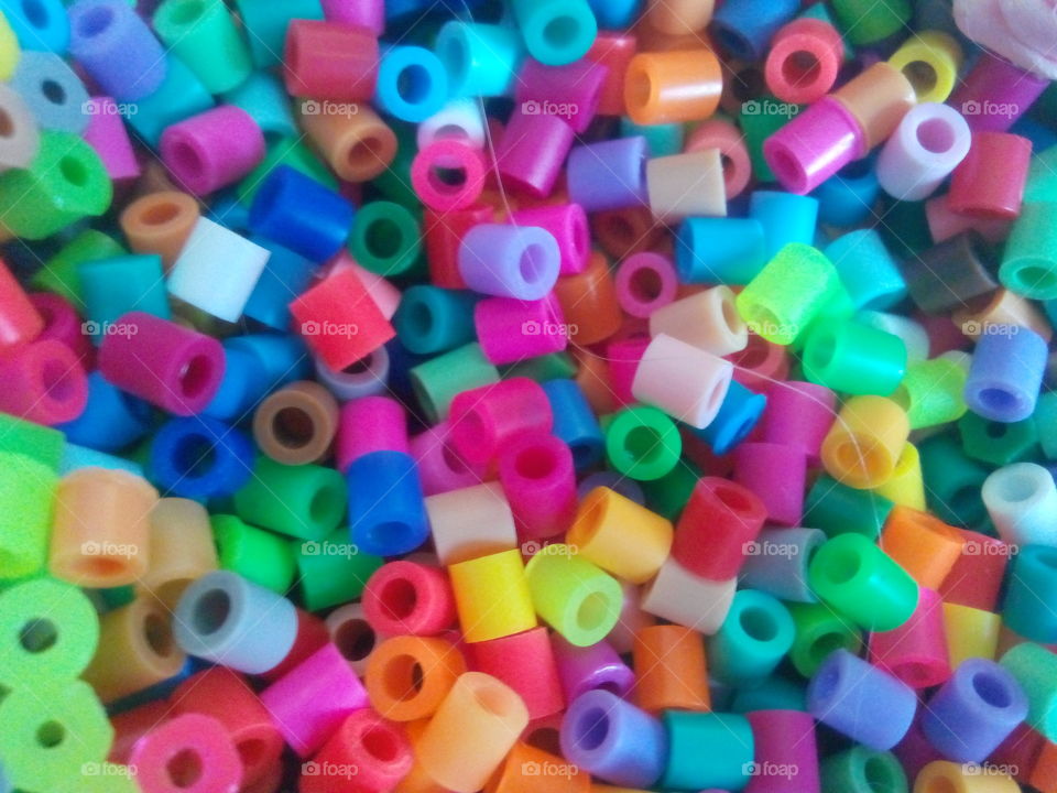 Colorful beads. crafting color plastic beads