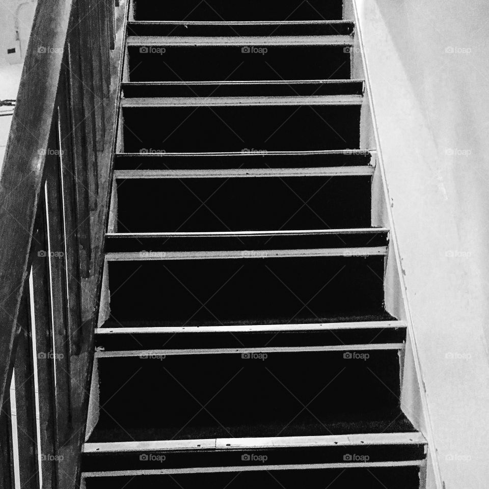 Steep steps in hotel in Amsterdam shot in black and white 