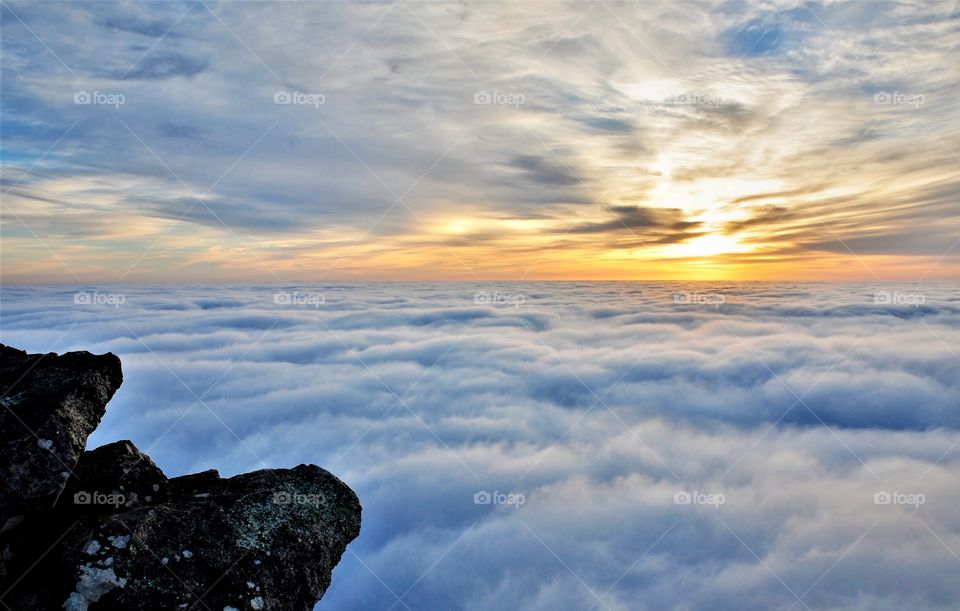 Sunrise Above the Clouds