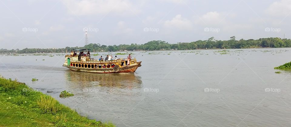 Engine boat crossing river