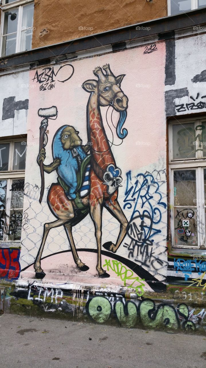 slovenia graffiti. cultural and unique. giraffe. insteresting, creative.