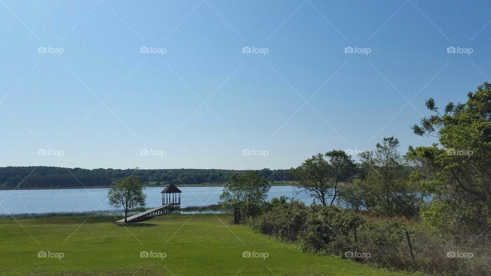 View of Lake with Gazebo and Trees