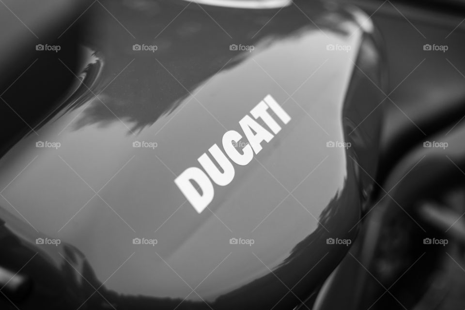 ducati motorcycle logo on the reservoir