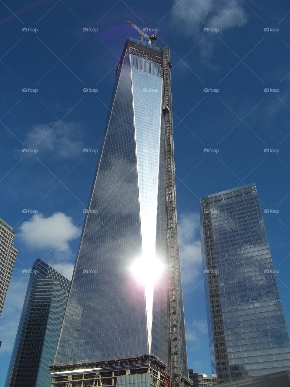 Freedom Tower. One World Trade Center catches the sun