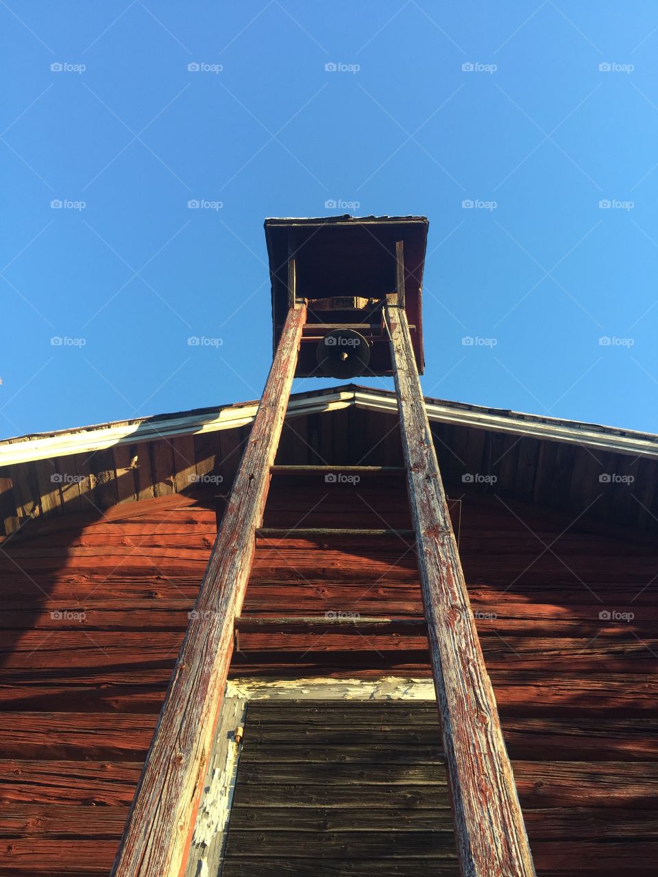Fire bell. Wooden tower with bell