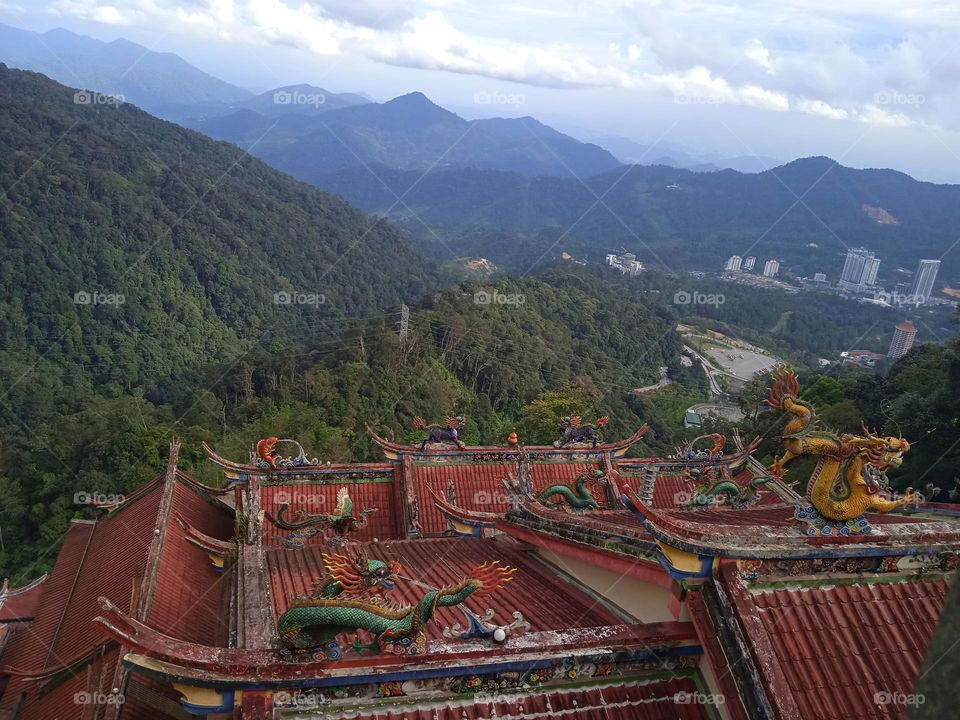 The view of the mountains with the roofs of the temple.