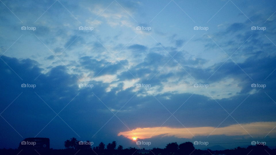 the most beautiful deep blue sky and clouds and sunset
