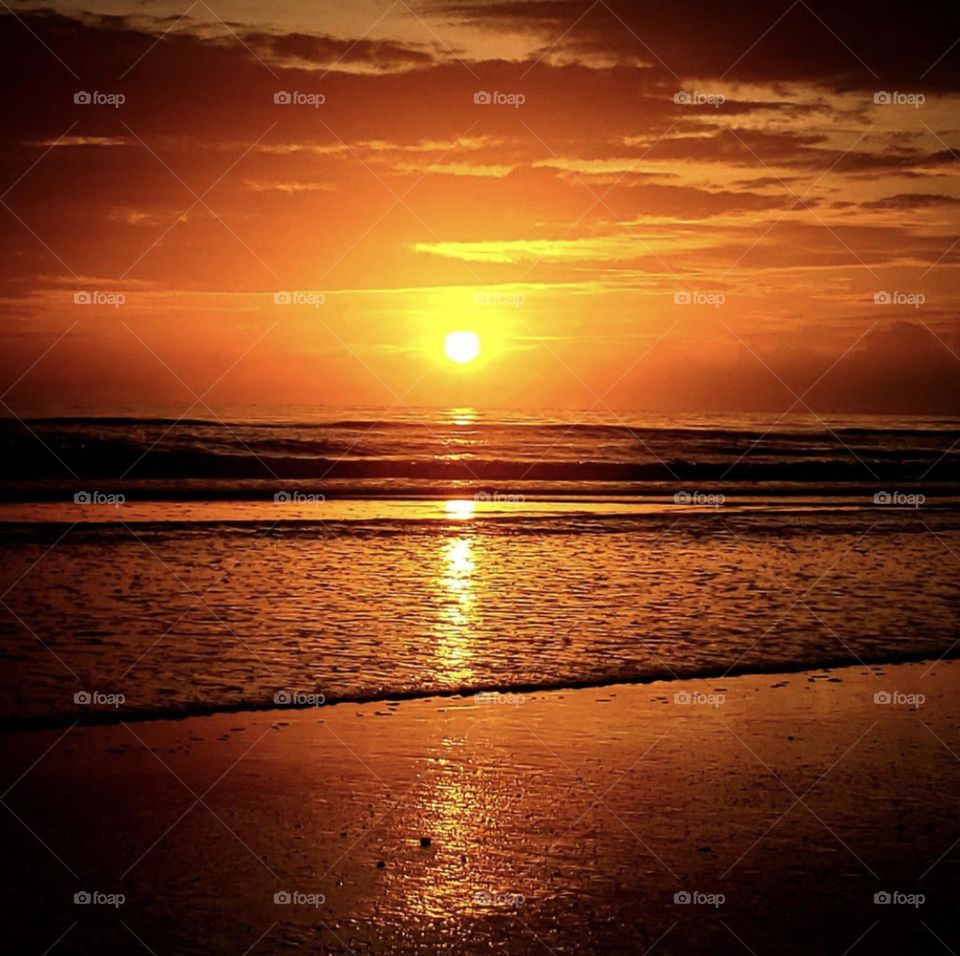 A beautiful orange sunrise at the sea