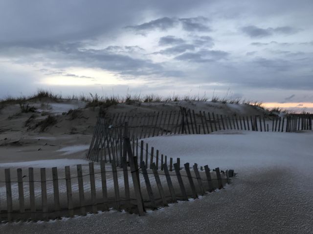Snowy beach at dusk