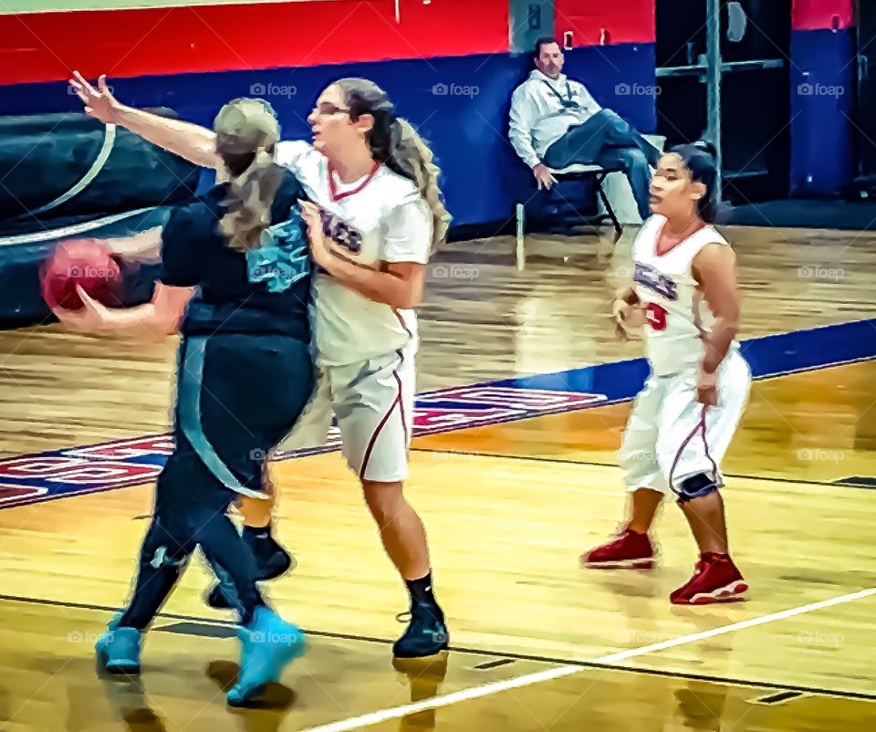 My sister #42 playing on her high school basketball team. I took on my iPhone 7.