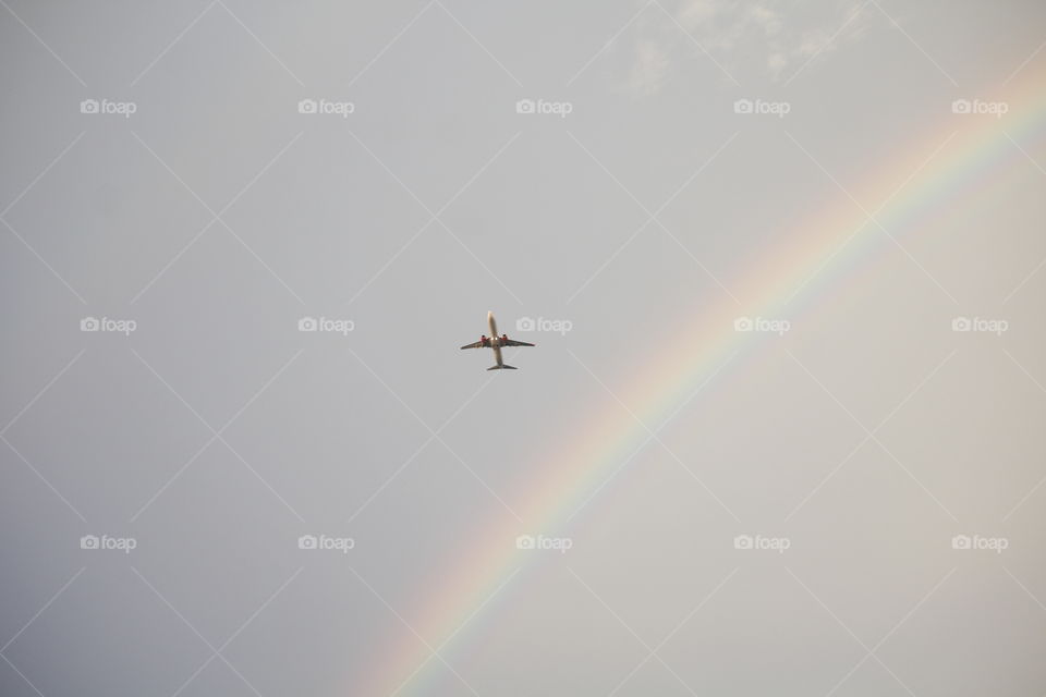 plane and the rainbow
