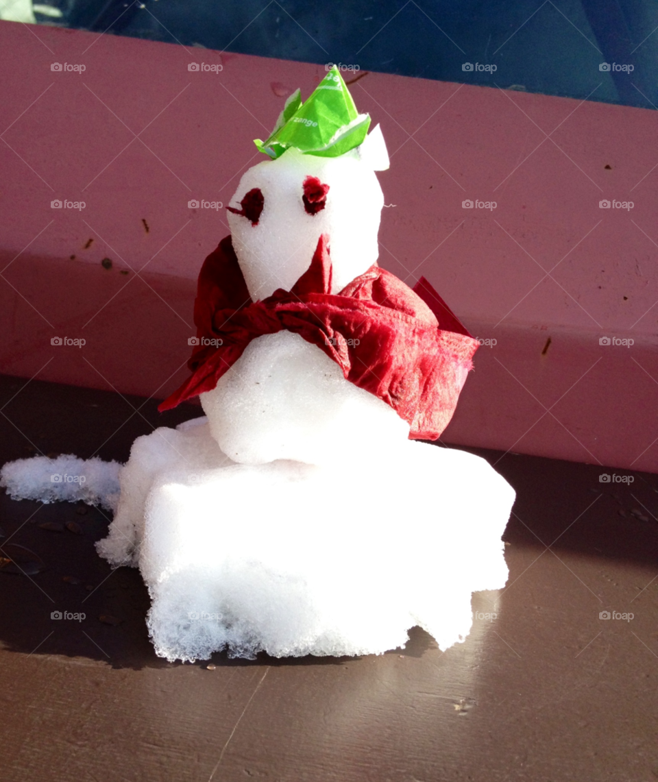 verbier a mini snow man. on a restaurant table by swisstraveler