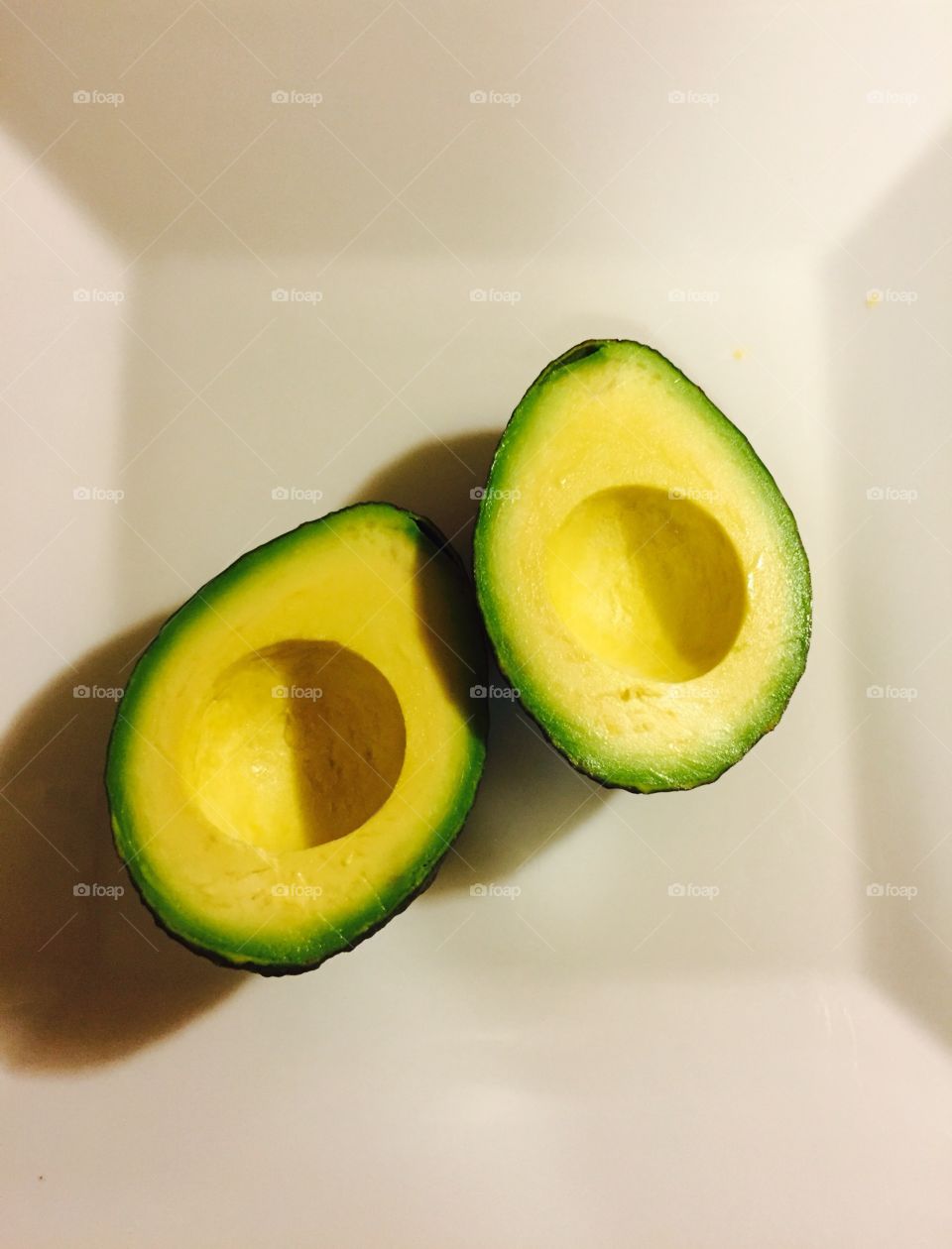 Perfectly halved avocado