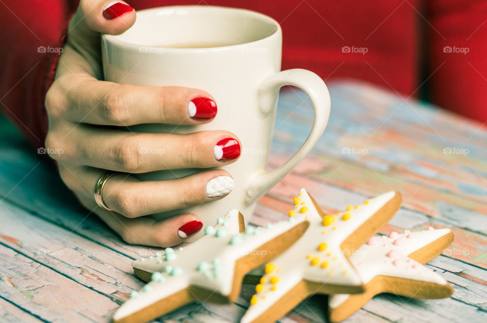 woman hand with cup of tea