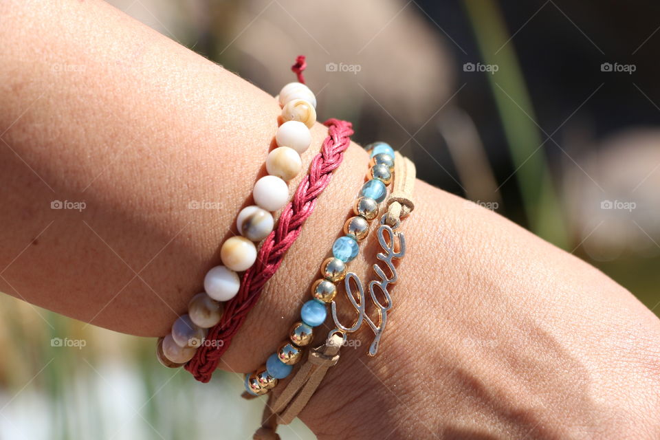 Woman wearing handmade bracelets 