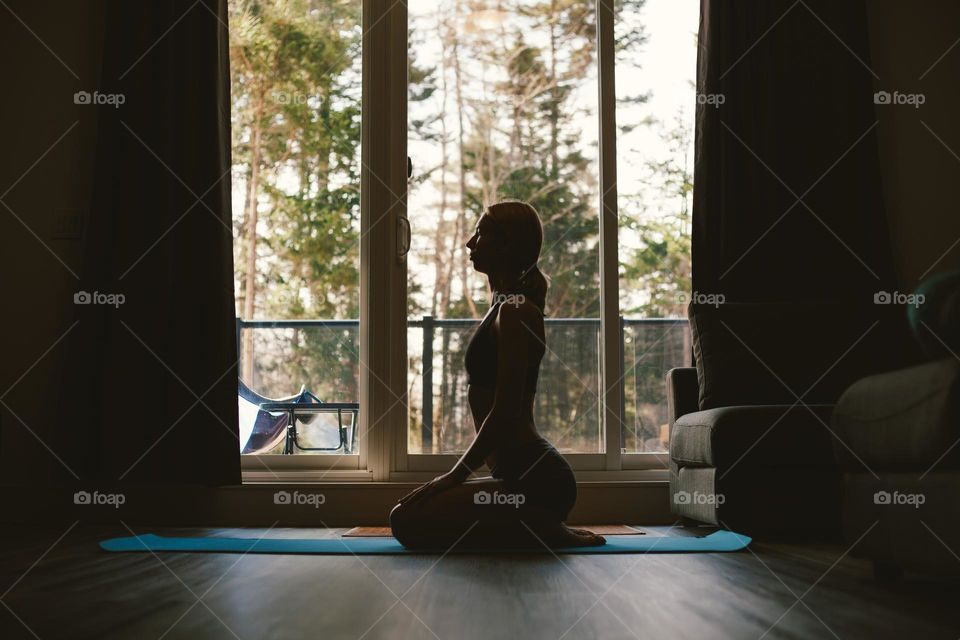 girl meditating at home