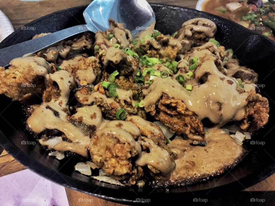 A Filipino favorite with a twist!
Sisig. Lechon & Oyster Sisig. 