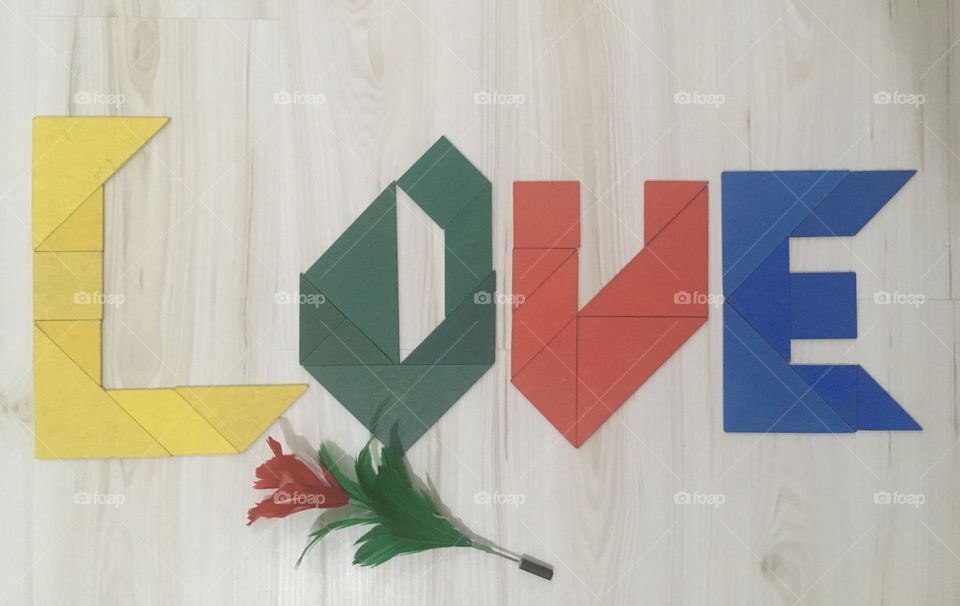 Beautiful love text on table