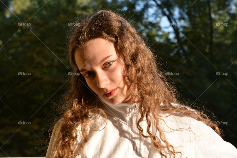 young girl beautiful portrait in sunlight