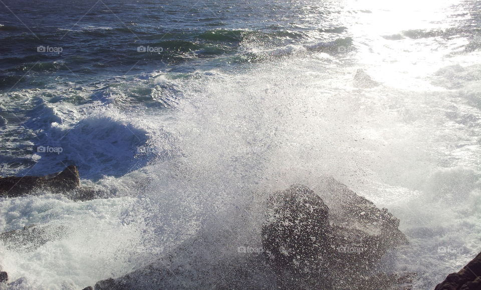 Spray from a wave that slamed into the rocks at Doornbaai on the South African west coast.