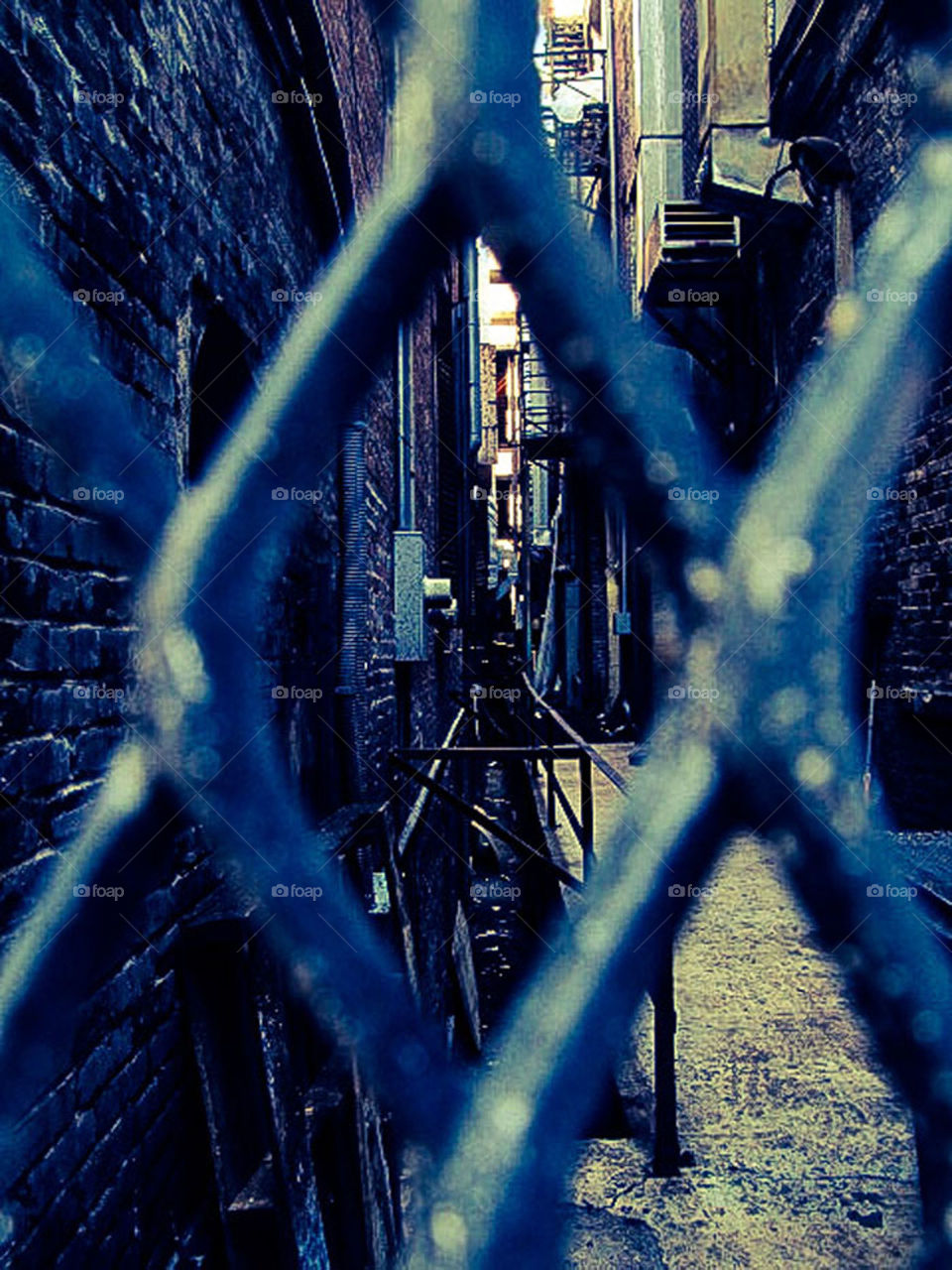 Gated Alley. An gated alley between two buildings