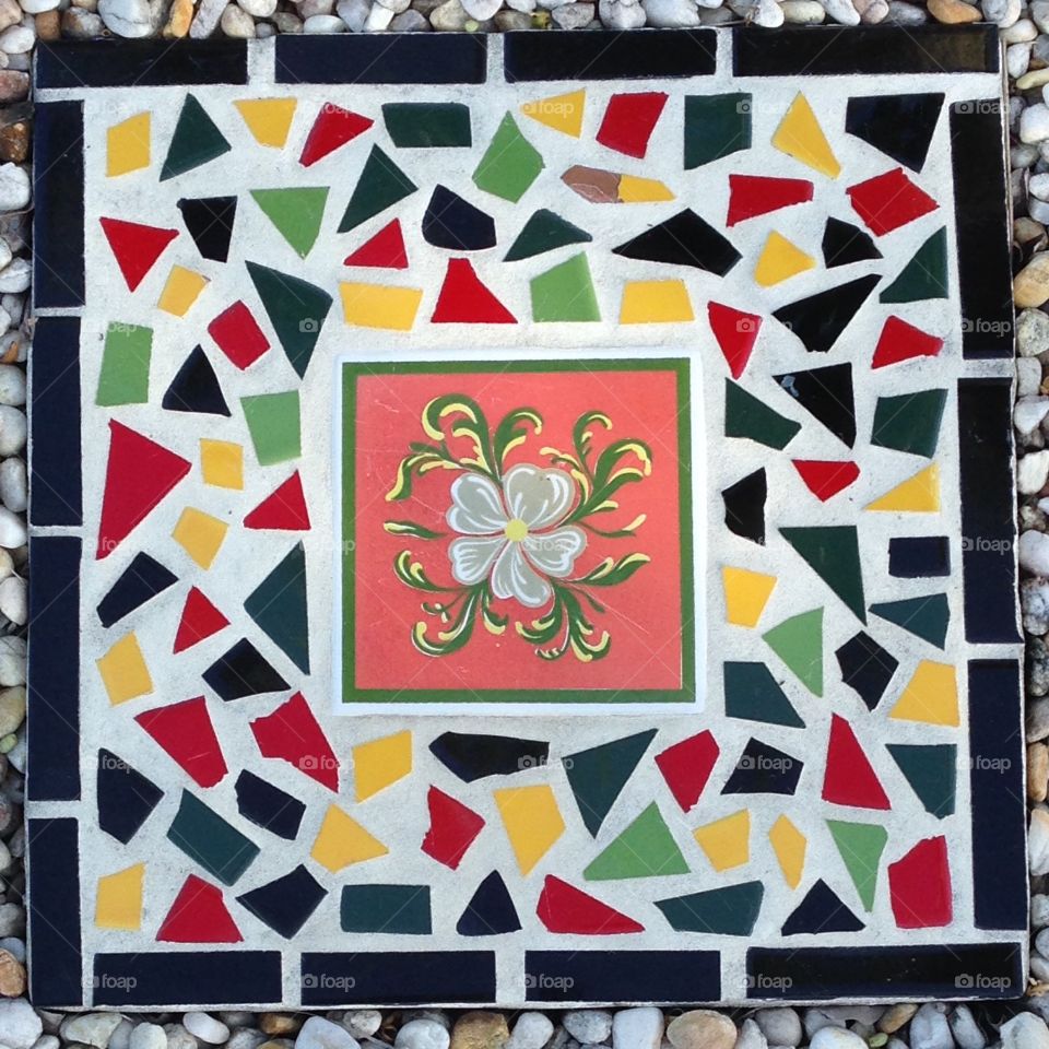 Colorful mosaic floral tile stepping stone