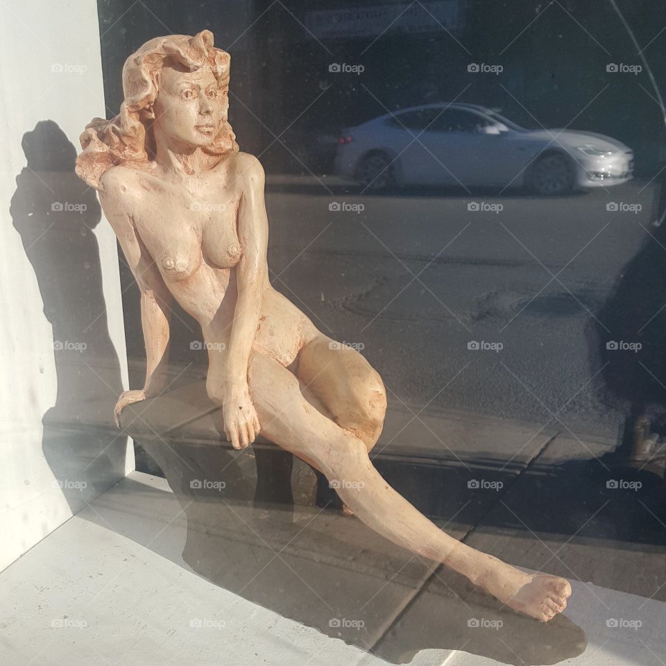nude art in window