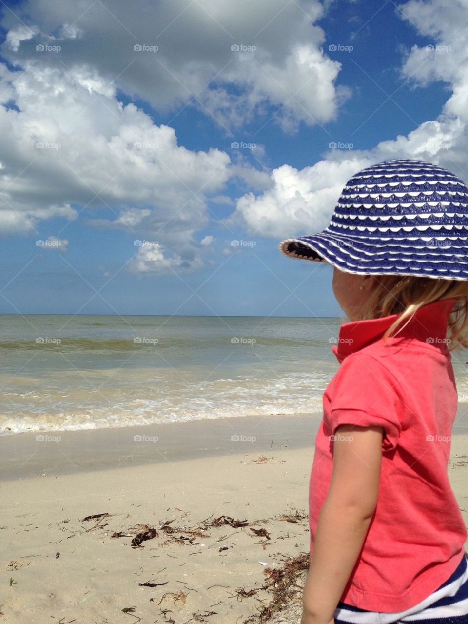 Child looking at the ocean