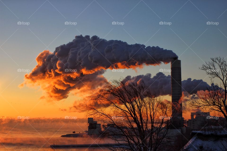 Smoke coming out from smoke stacks