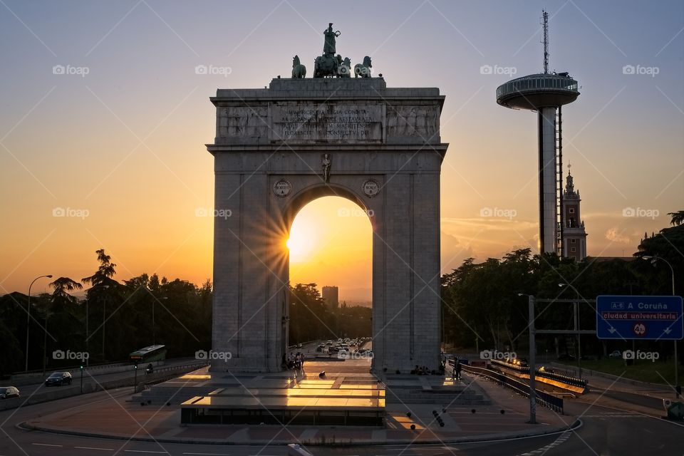 Arco del triunfo and Faro de Moncloa at sunset, Madrid