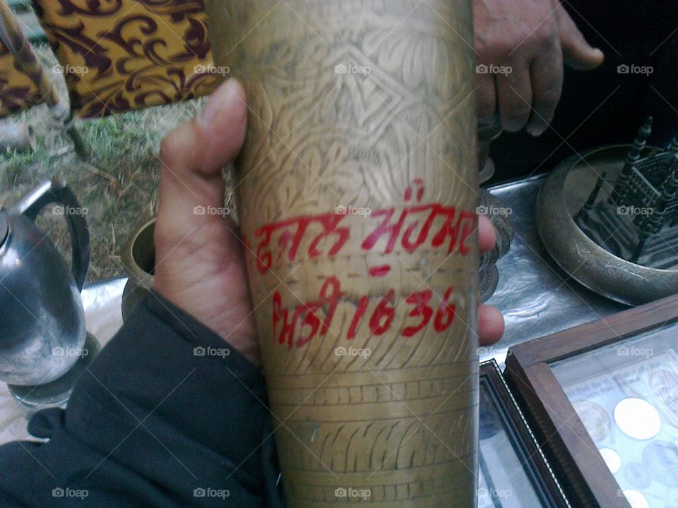 old antique glass made of Brass, made in 1636.