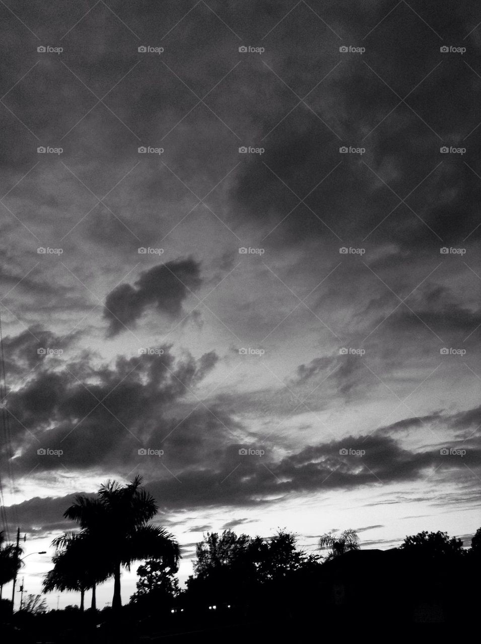 Evening sunset with cloudy sky.