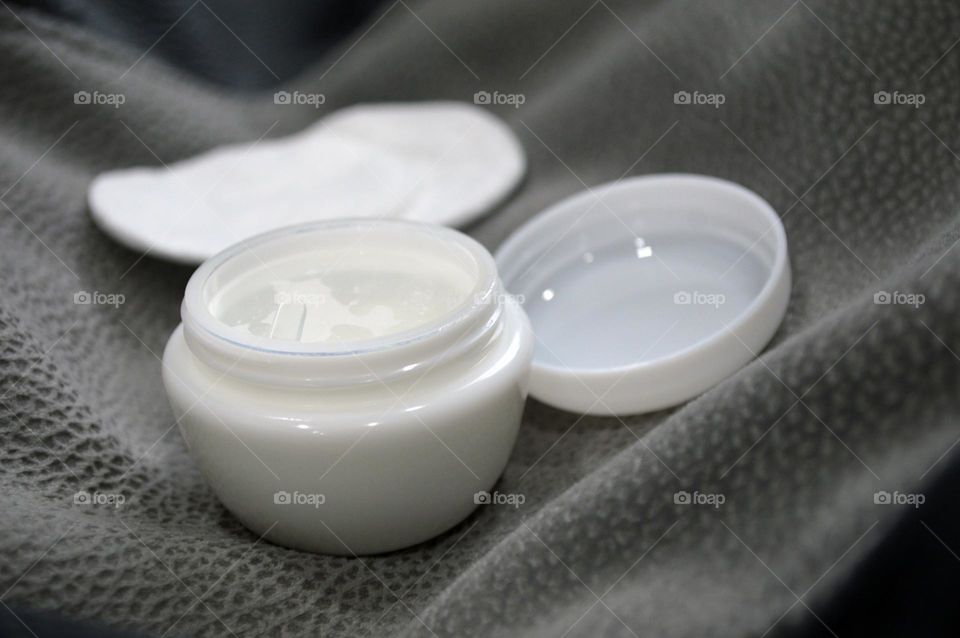 Jars with cream, shampoo and cosmetics