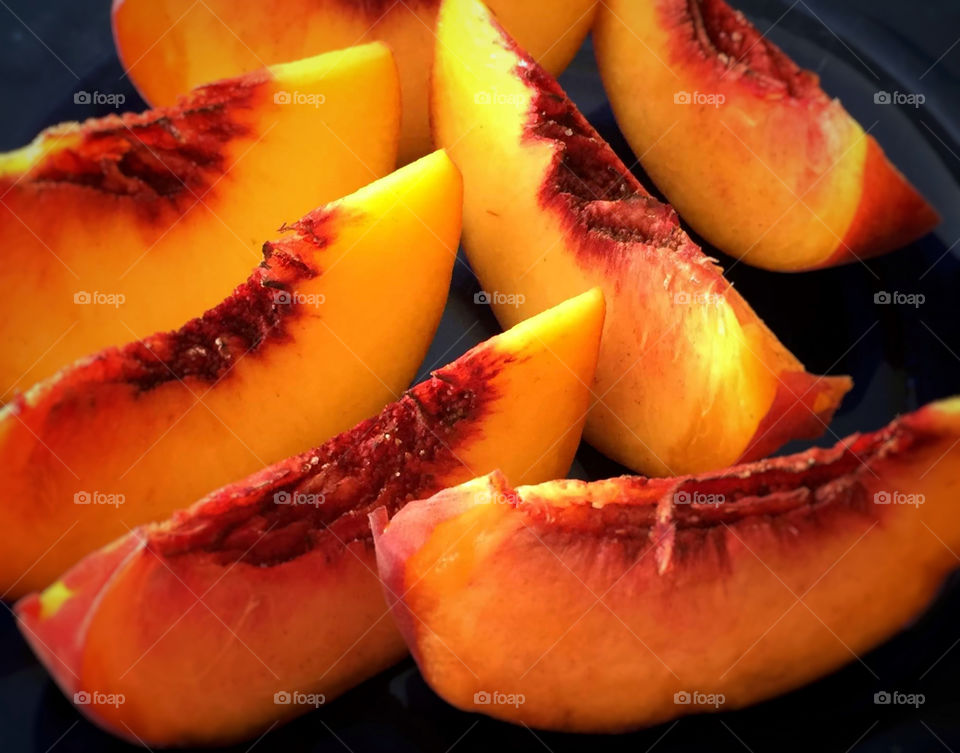 Peach slices on a plate