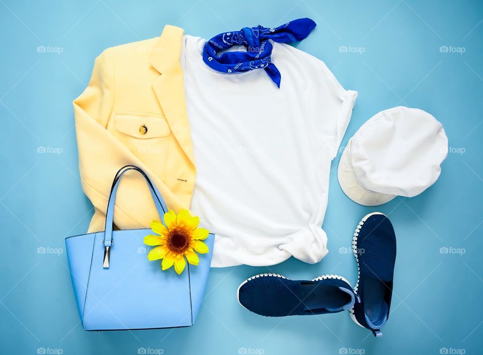 Closing flat lay, blue and yellow color pop