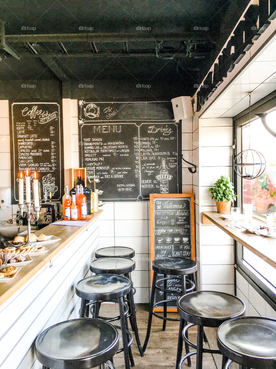 Cafe interior in Vaxholm, Sweden with menus