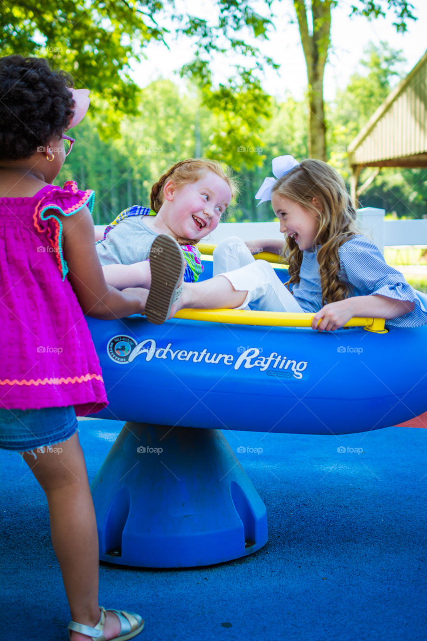 Girls Playing at the Park on a Raft 3