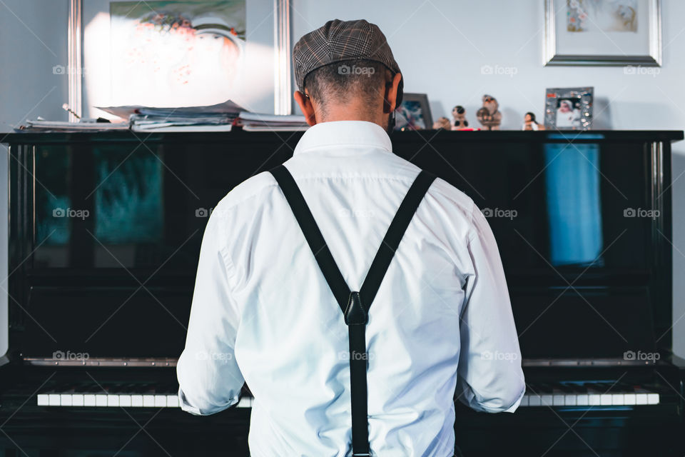 Man playing a piano 