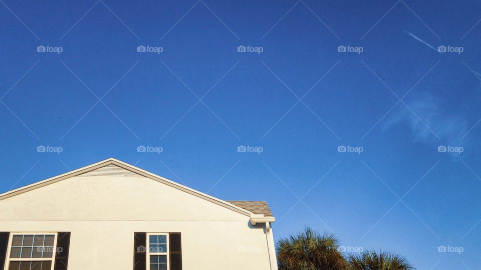 Blue Skies Over A Florida Home