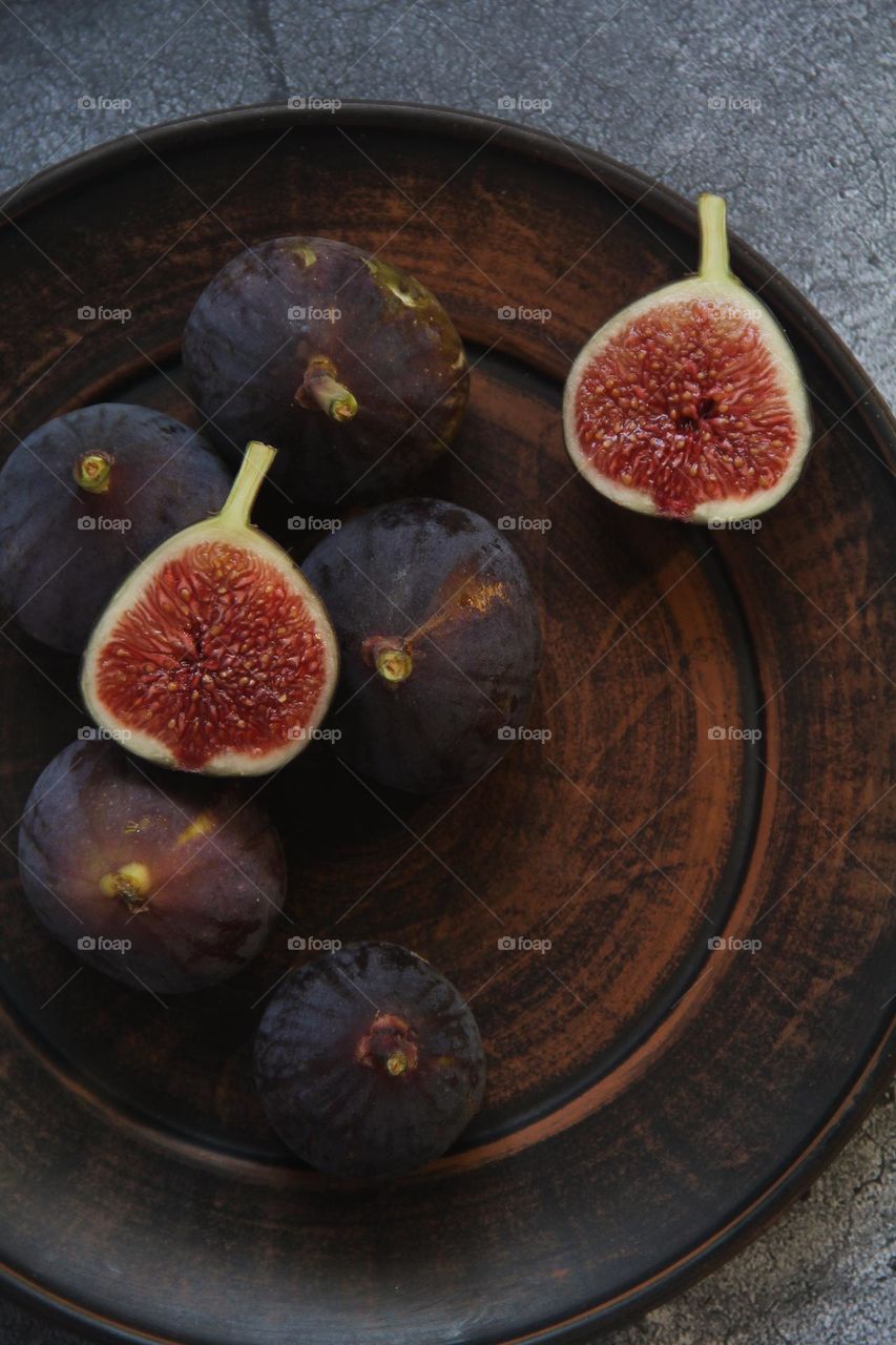 Figs on a brown plate